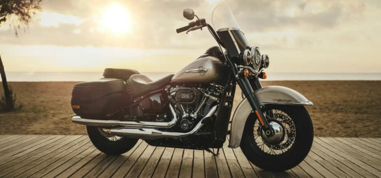 Chrome cruiser motorcycle parked on a wooden beach boardwalk at sunset, the cover photo of our Myrtle Beach Spring Bike Rally guide