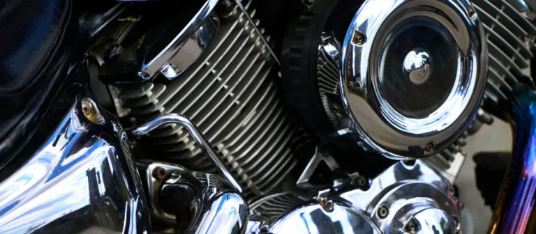 Close-up of a polished chrome V-twin motorcycle engine